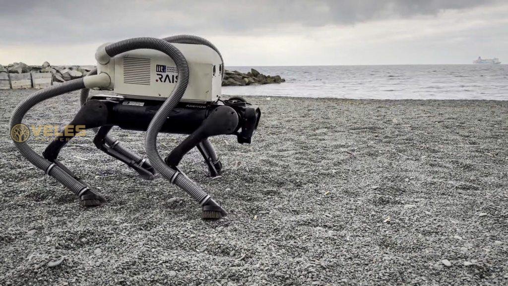 ROBOT DOG WITH VACUUM CLEANER PAWS CLEANS THE BEACH